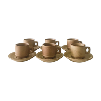 Stoneware coffee cups with saucers