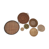Wall composition of baskets and braided wicker trays