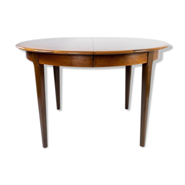 Dining table in rosewood with two extension plates, of danish design from the 1960s.