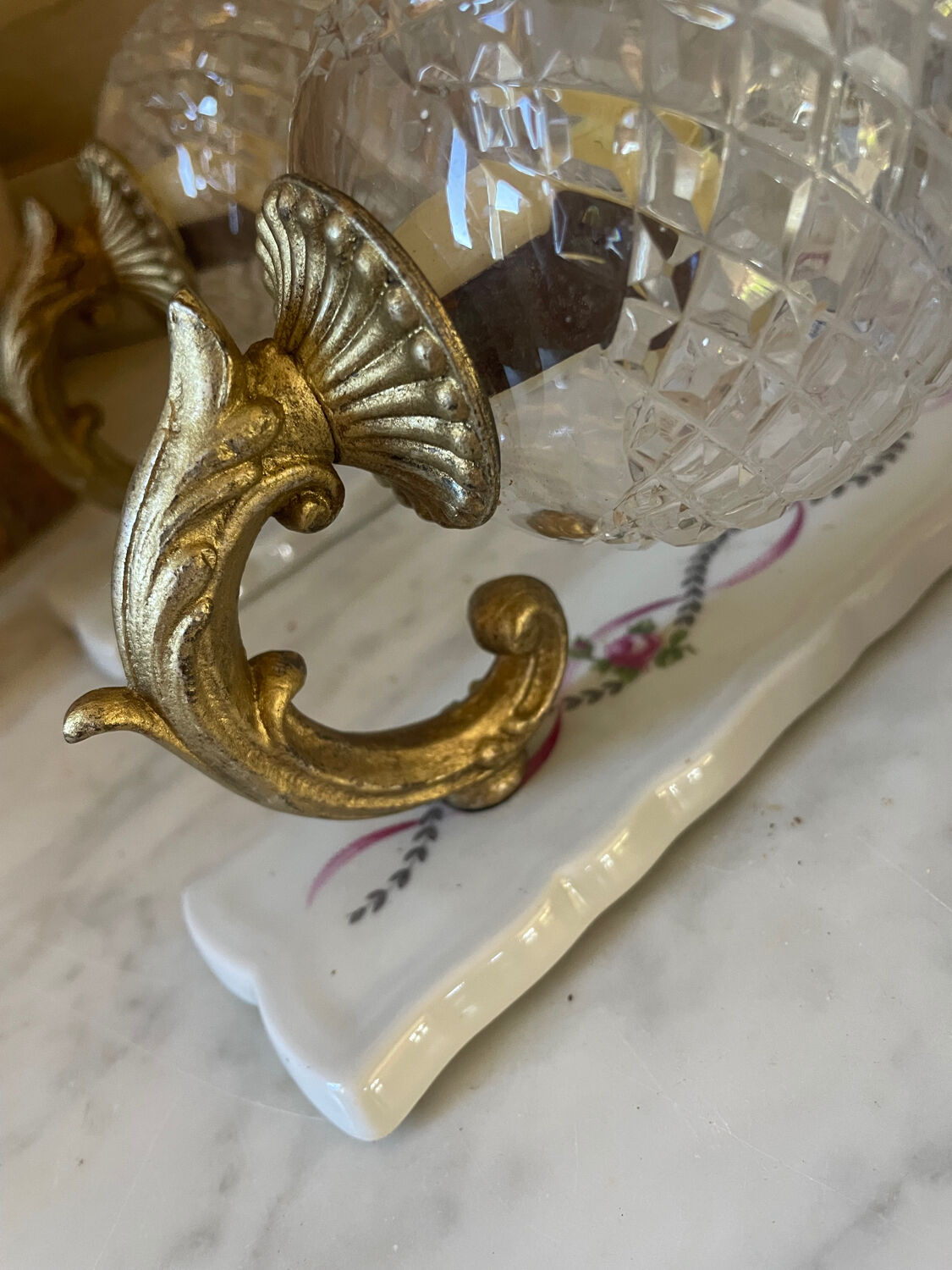 Pair of cut glass and Limoges porcelain wall sconces