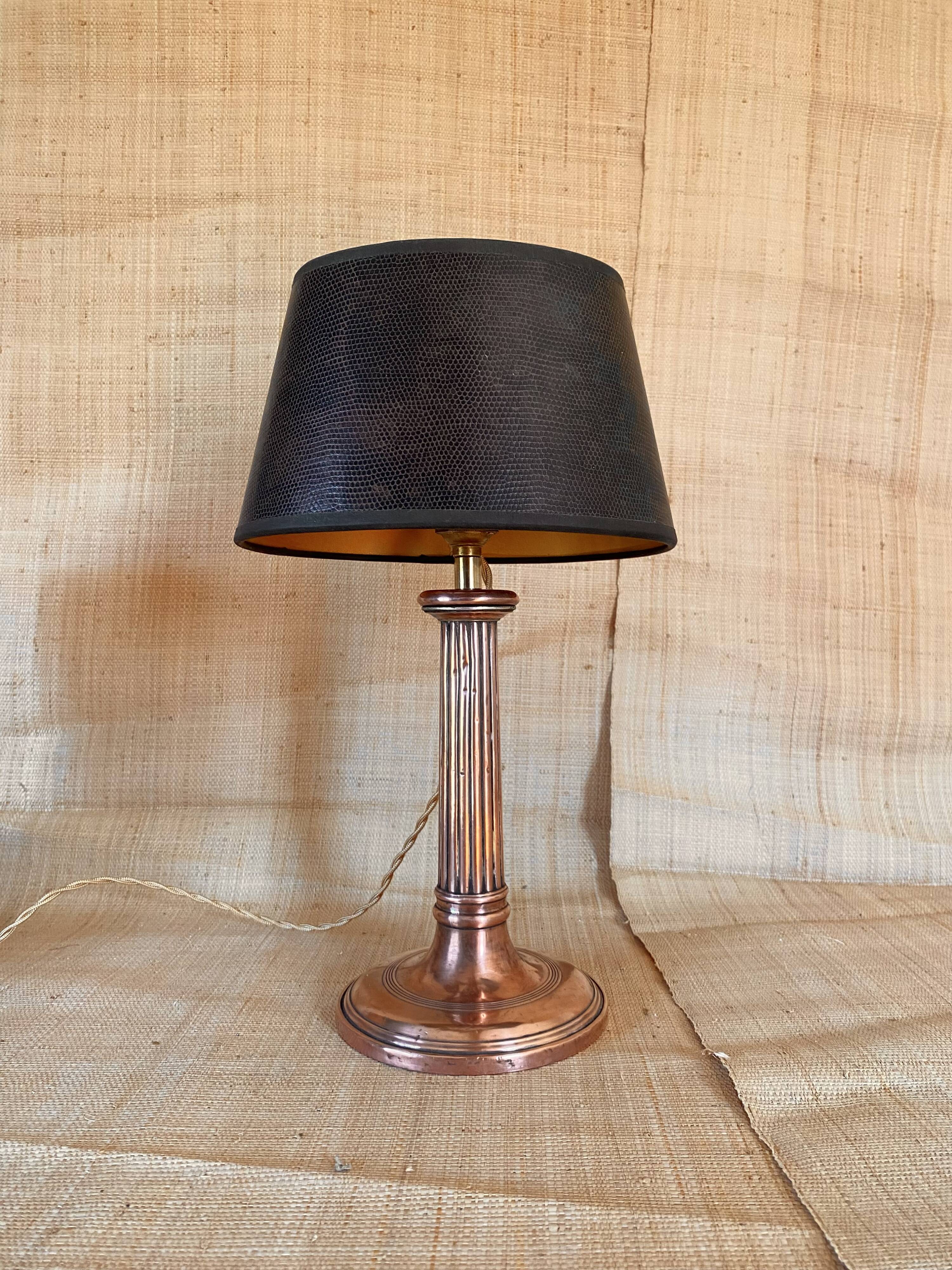 Copper lamp, fabric cable, sewn lampshade and leather.