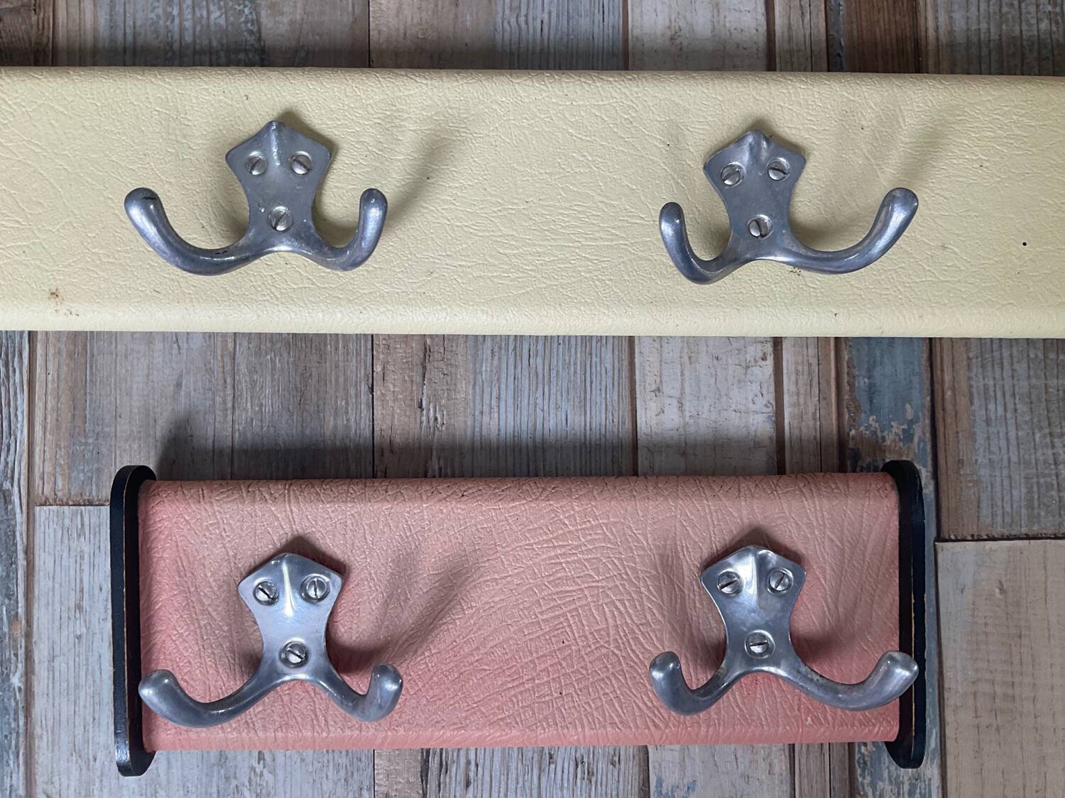 Duo of vintage coat racks from the 50s
