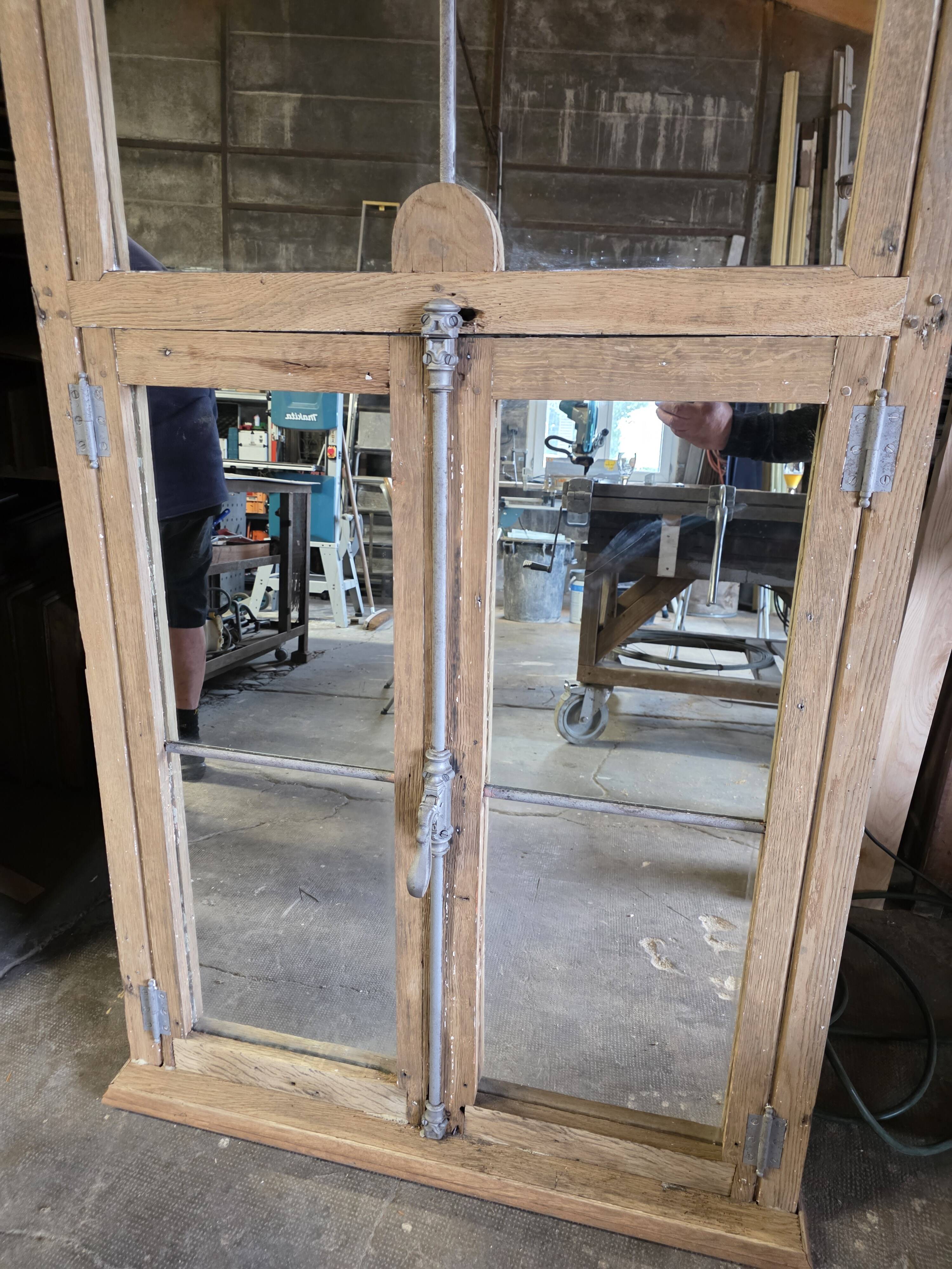 Eighteenth-century oak window mirror.