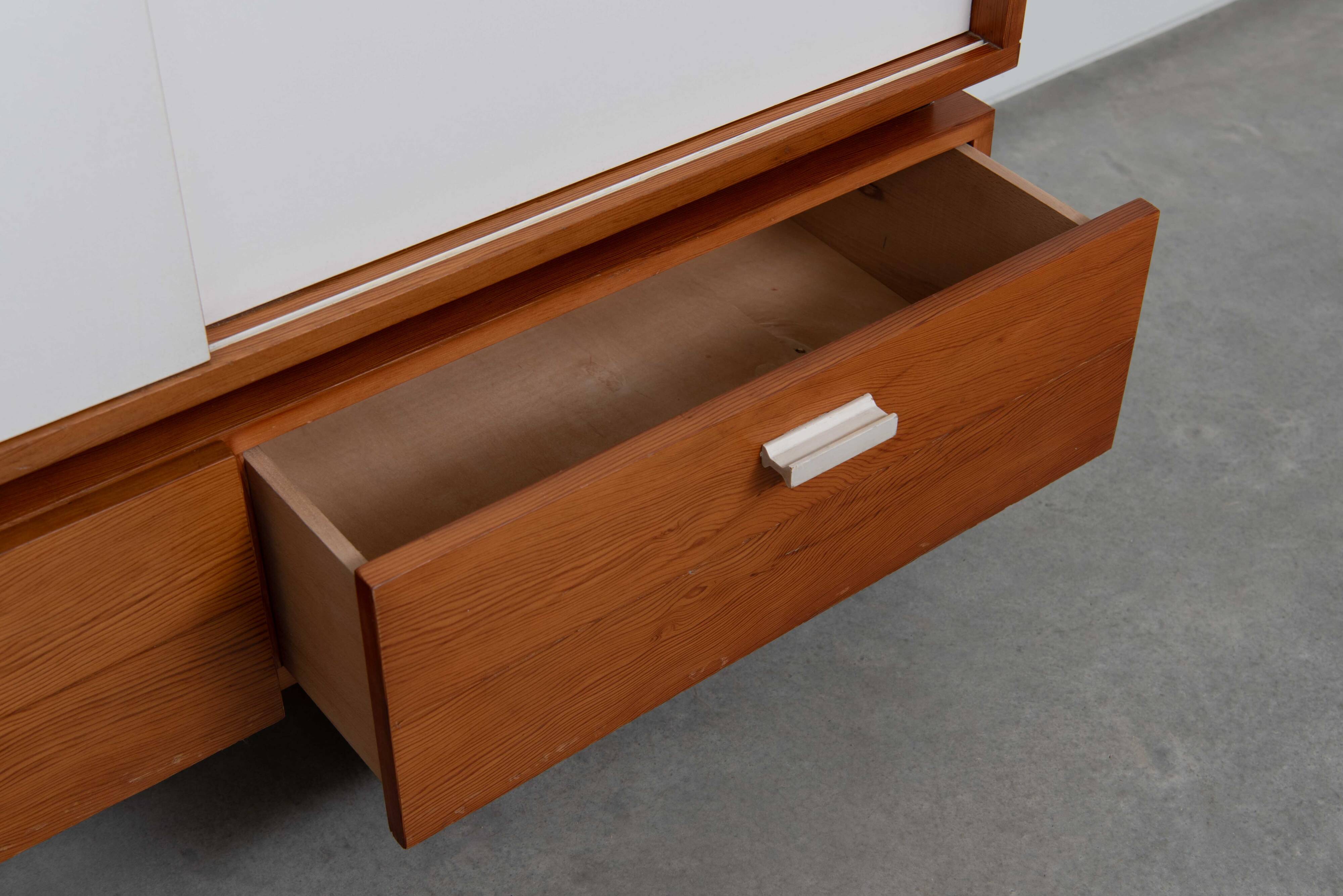 Teak wall shelf designed by Jul de Roover