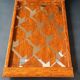 Two wooden and glass trays