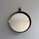 Round wall mirror with brass frame and leather hanger, 1960, Germany