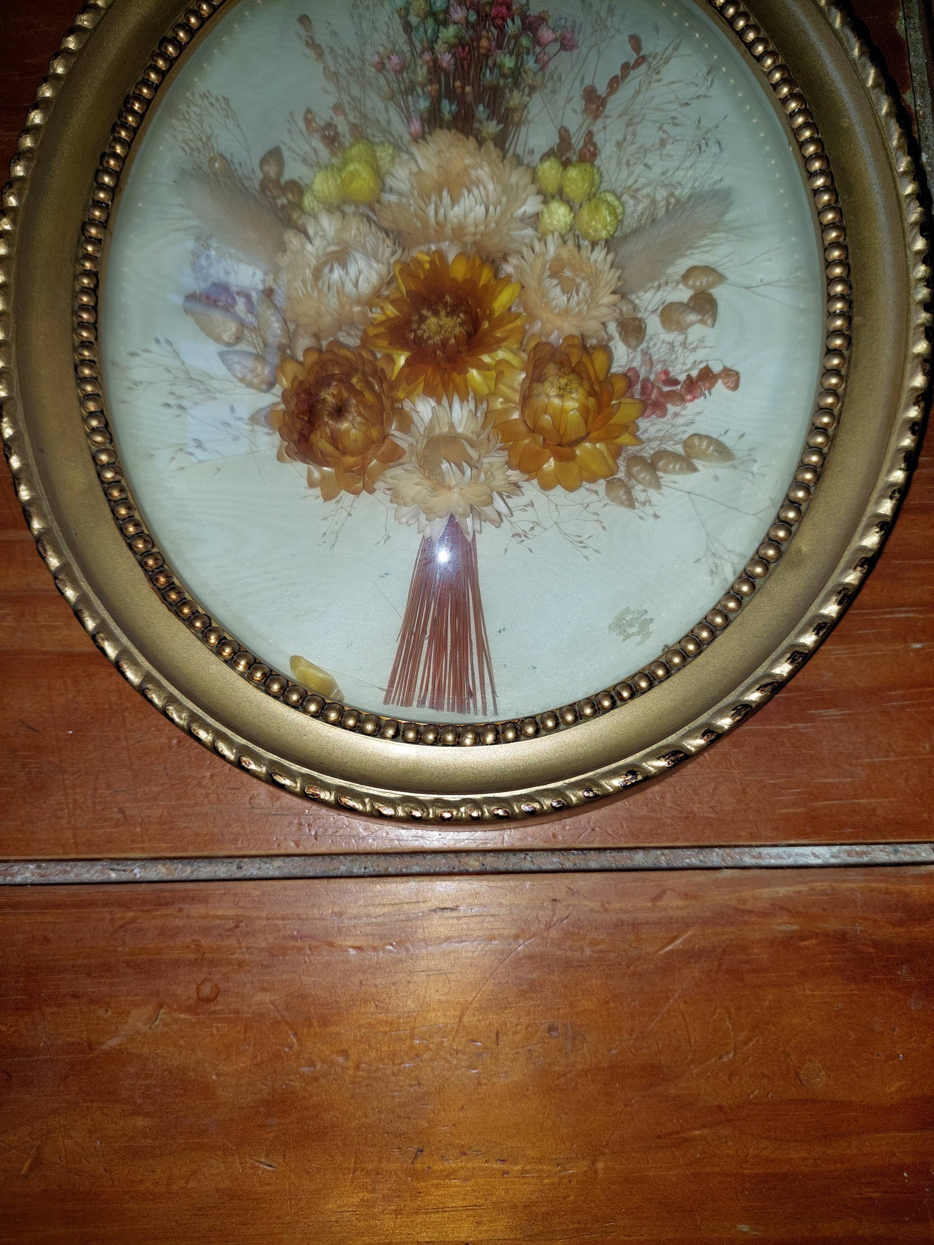 Oval frame domed dried flowers occasion