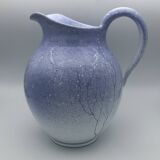 Blue glazed terracotta pitcher with hand-painted decoration, signed