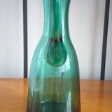 Pitcher made of green glass blown and tinted in the mass