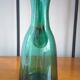Pitcher made of green glass blown and tinted in the mass