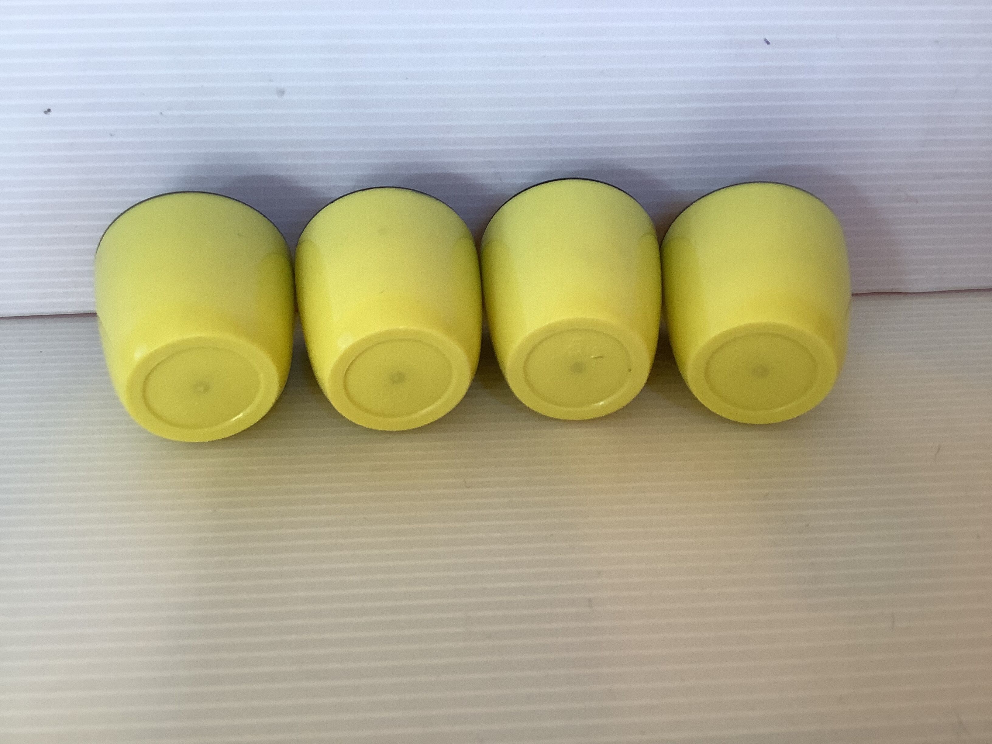 4 old eggcups yellow and black Emsa