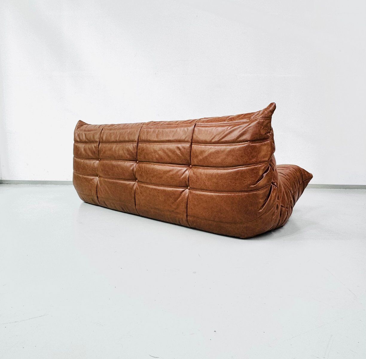 Togo sofa in cognac cowhide by Michel Ducaroy for Ligne Roset.
