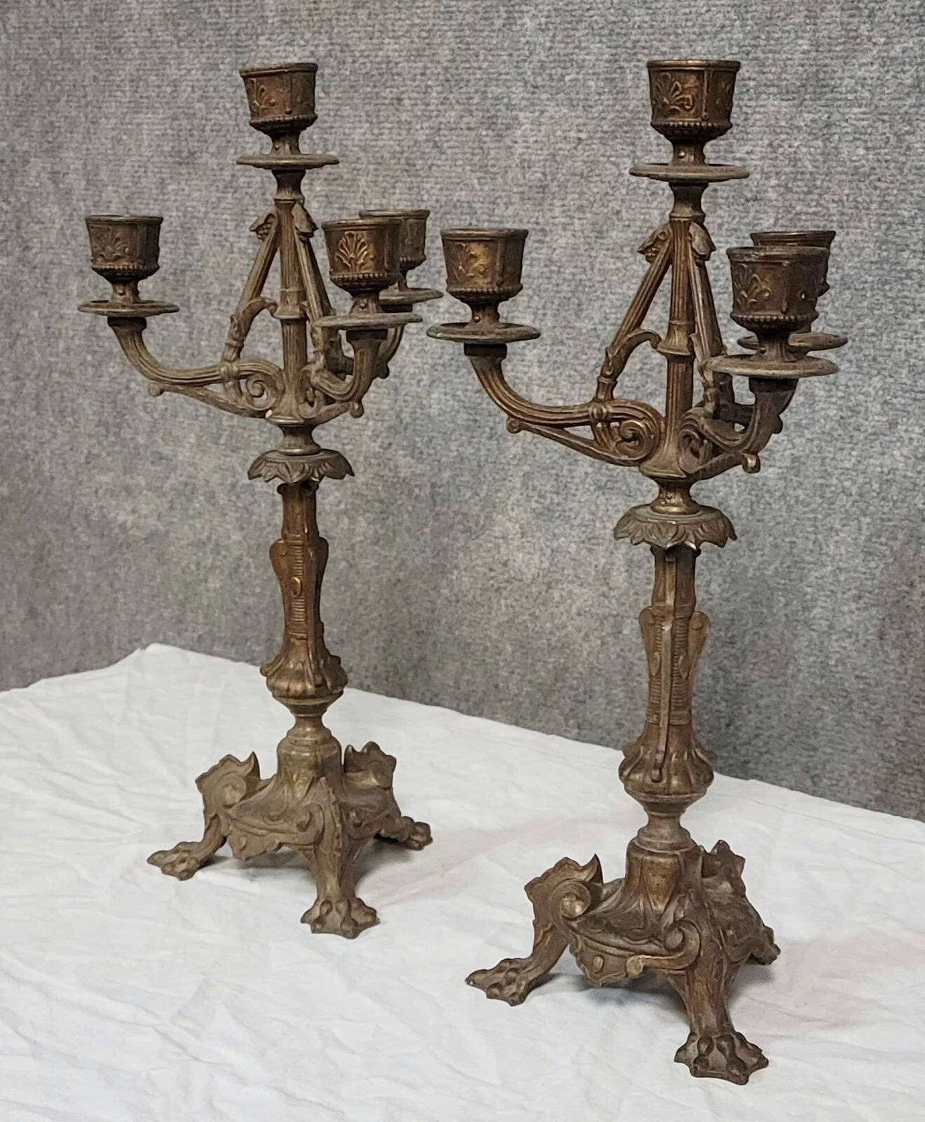 Pair of antique candelabra in patinated bronze spelter