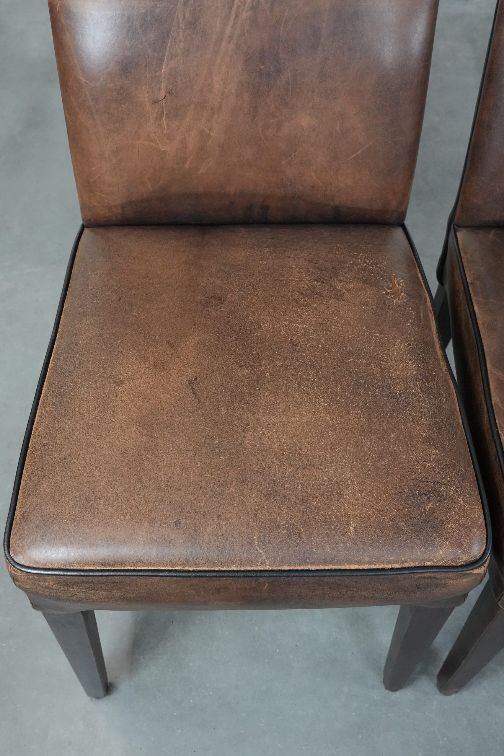 Great set of 8 stylish vintage sheepskin dining chairs with character