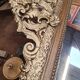 Old Louis Philippe style mirror in gilded wood with pediment