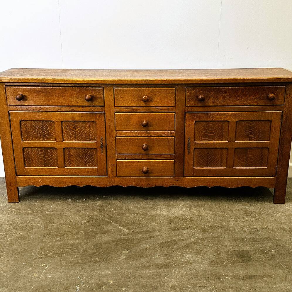 Vintage french oak sideboard with wavy details, ca. 1950s
