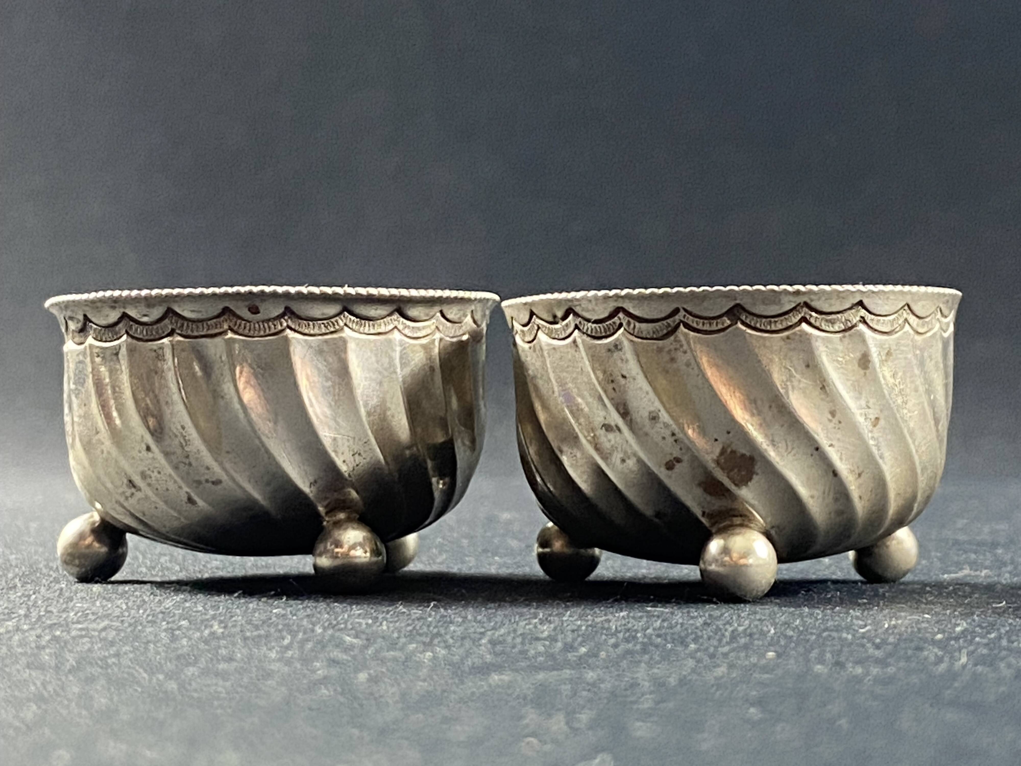 Pair of solid silver salt cellars with weevil hallmark