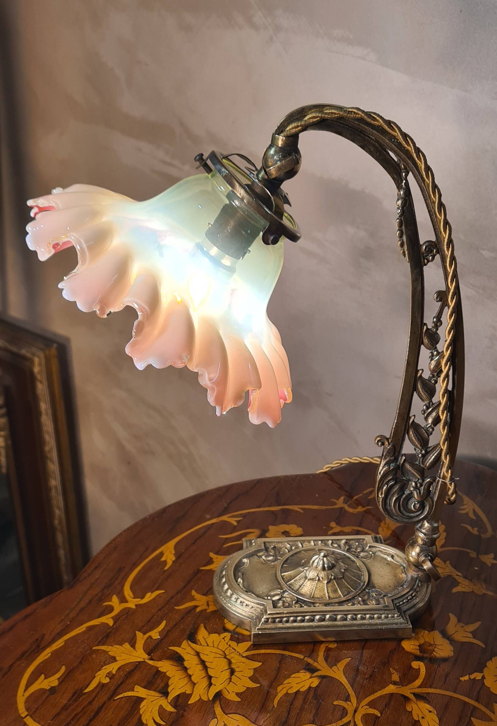 old art nouveau bronze lamp 30x25 with opalescent tulip red interior very rare