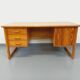 Vintage sled leg pine executive desk from the 60s-70s