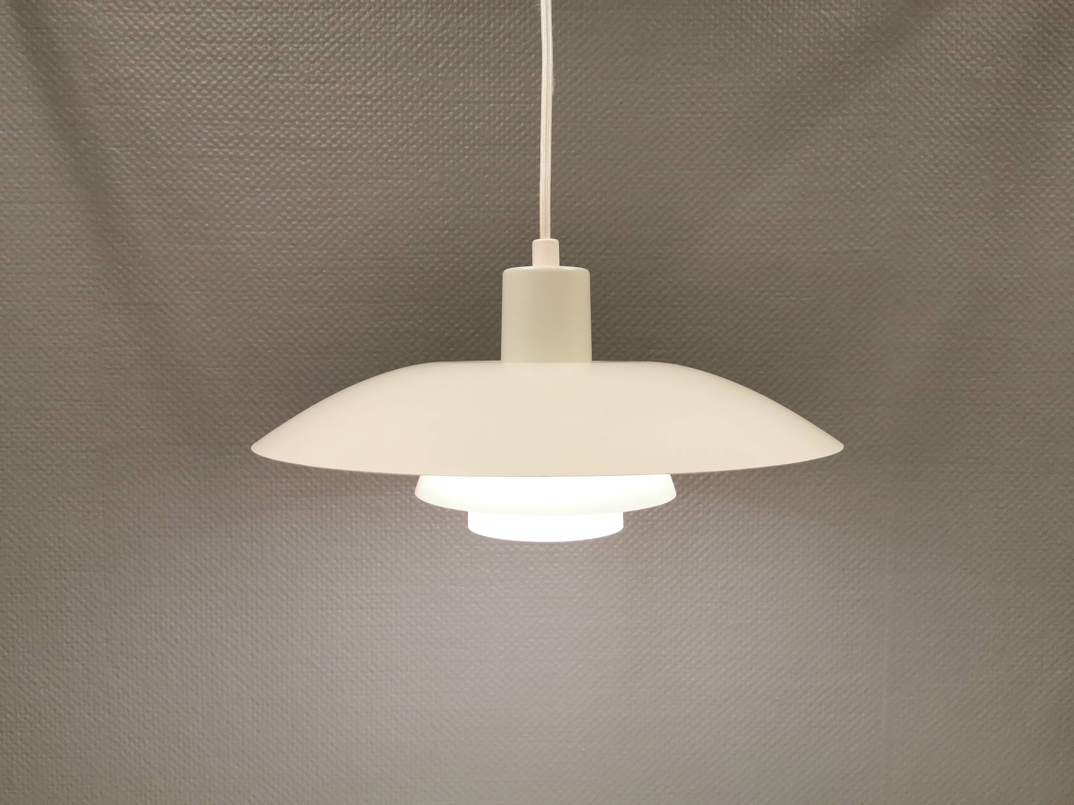 Older ph 4/3 hanging lamp, in white, with original orange dimmer.