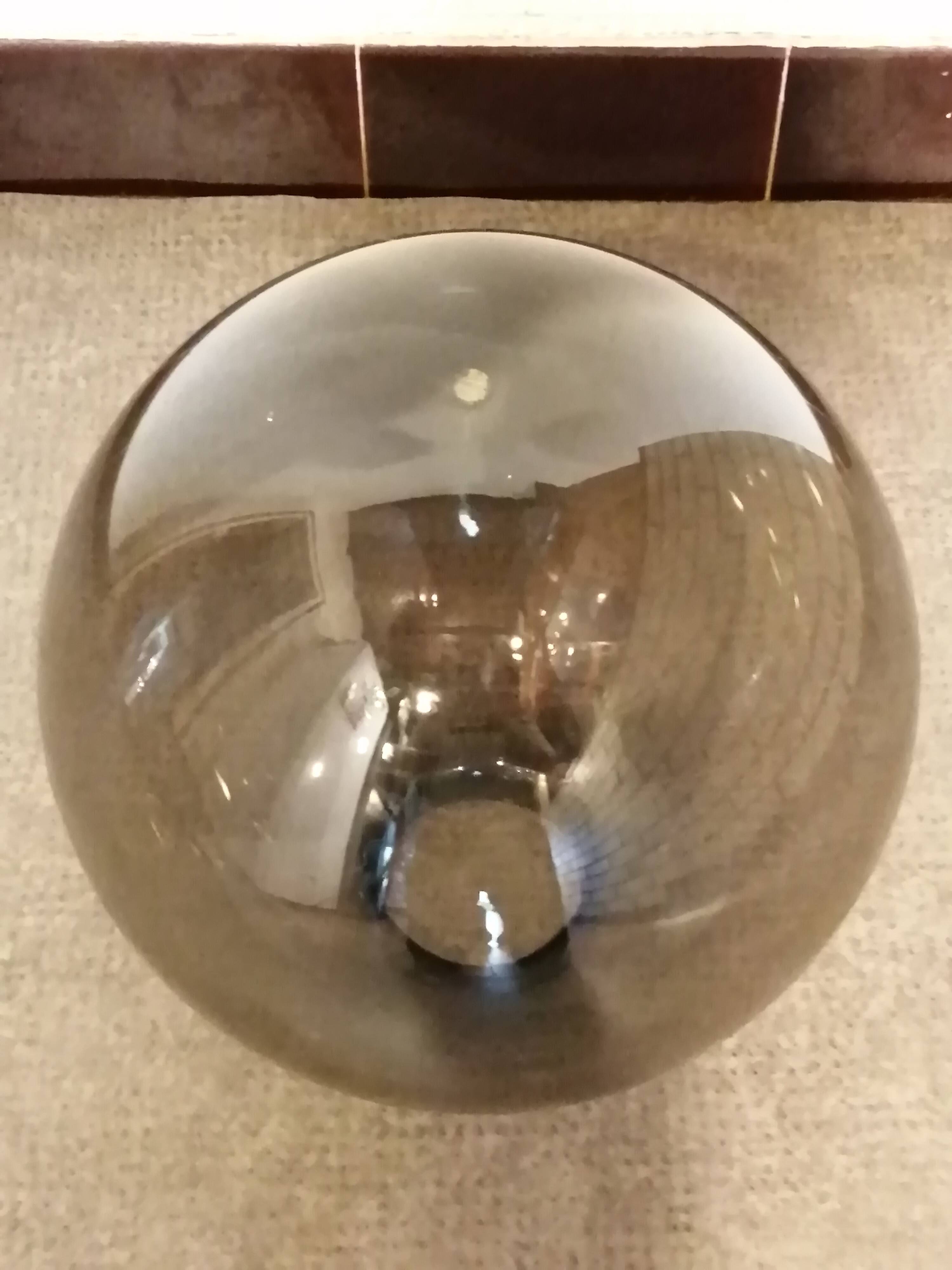 Adjustable metal floor lamp with its vintage smoked ball model from Roger Pradier 1970