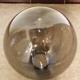 Adjustable metal floor lamp with its vintage smoked ball model from Roger Pradier 1970