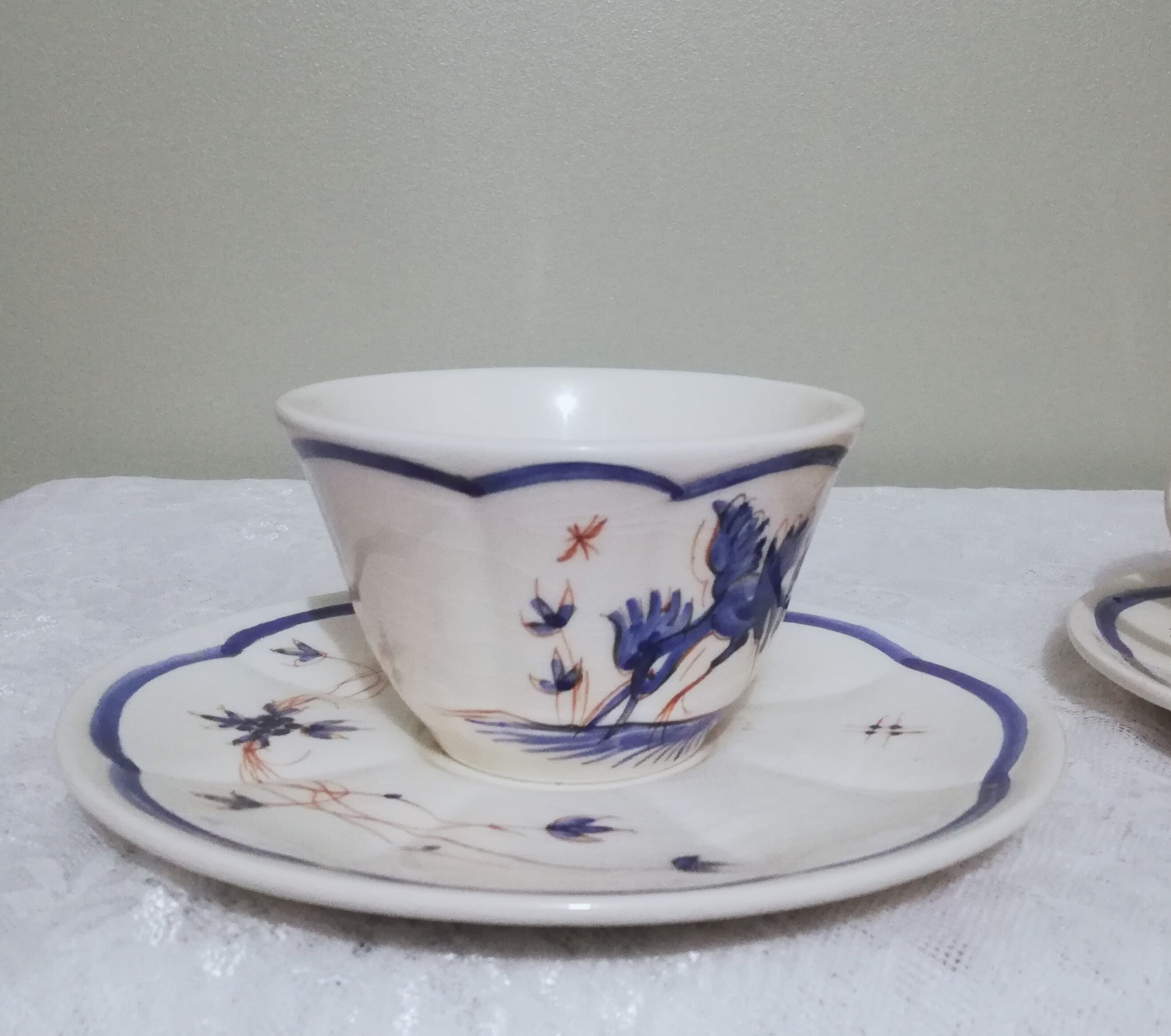 Two ceramic cups by Grignan signed Peguet