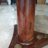 Pedestal table above marble