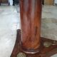 Pedestal table above marble