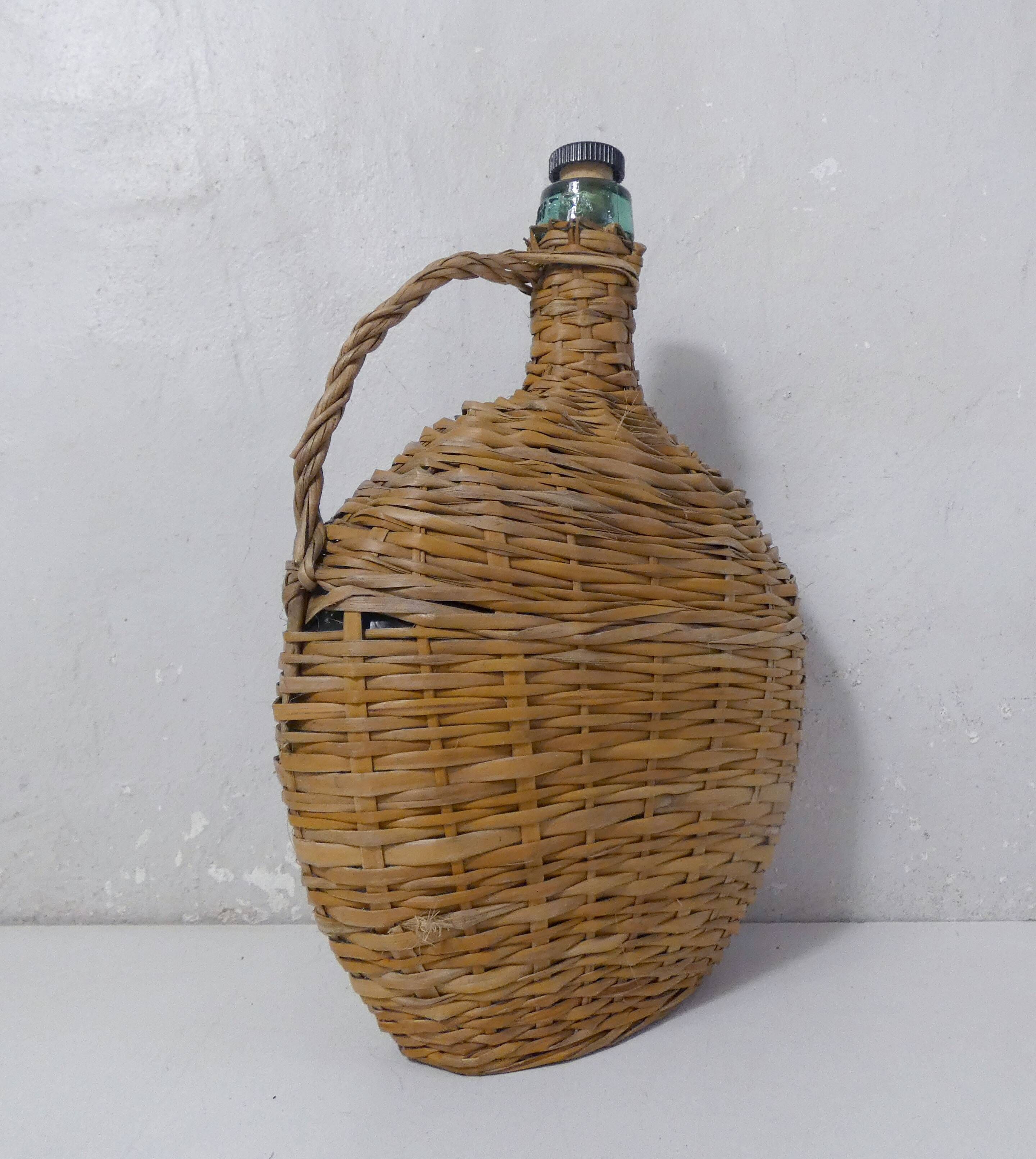 old bottle dressed in rattan vintage pilgrim gourd