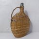 old bottle dressed in rattan vintage pilgrim gourd