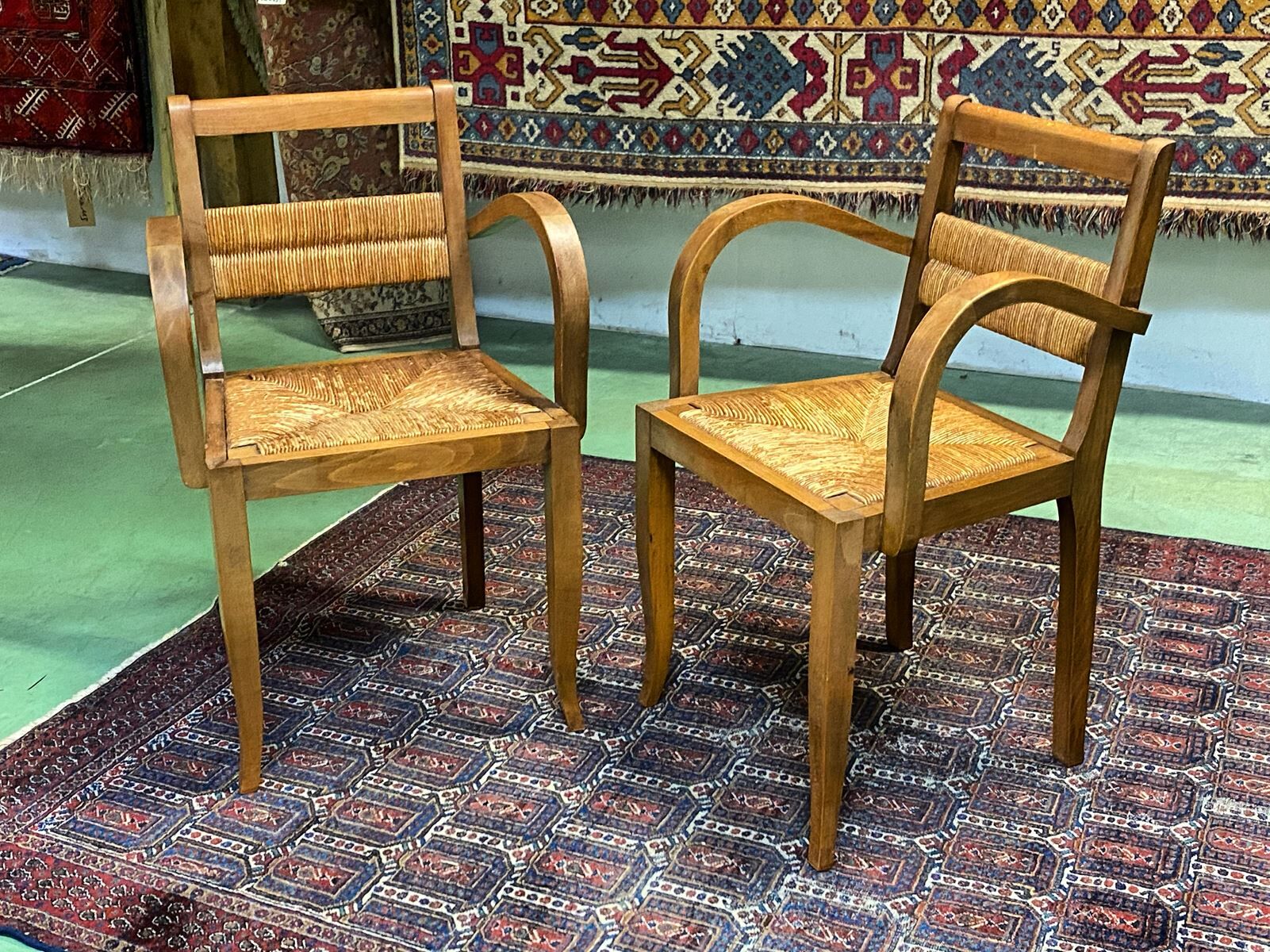 Pair of beech and straw armchairs