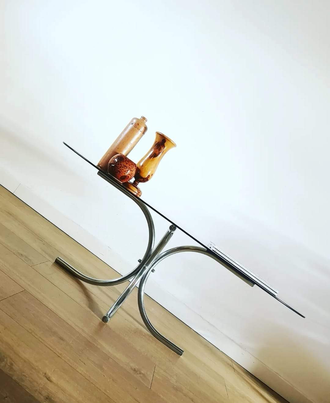 Oval smoked glass coffee table