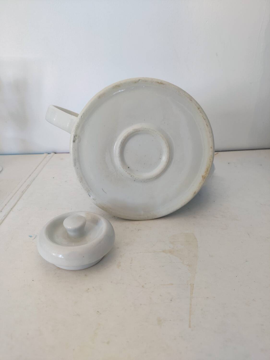 Small white porcelain teapot
