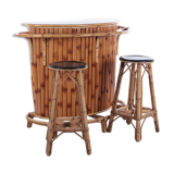 Vintage bamboo Tiki bar cocktail bar with 2 bar stools.