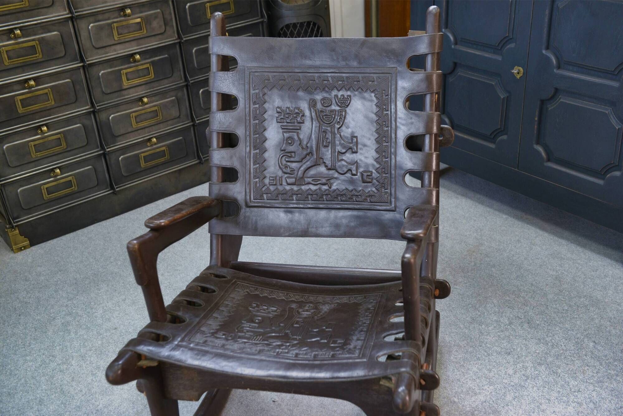 Armchair with ottoman by Angel Pazmino in brown wood and leather from the 1960s.