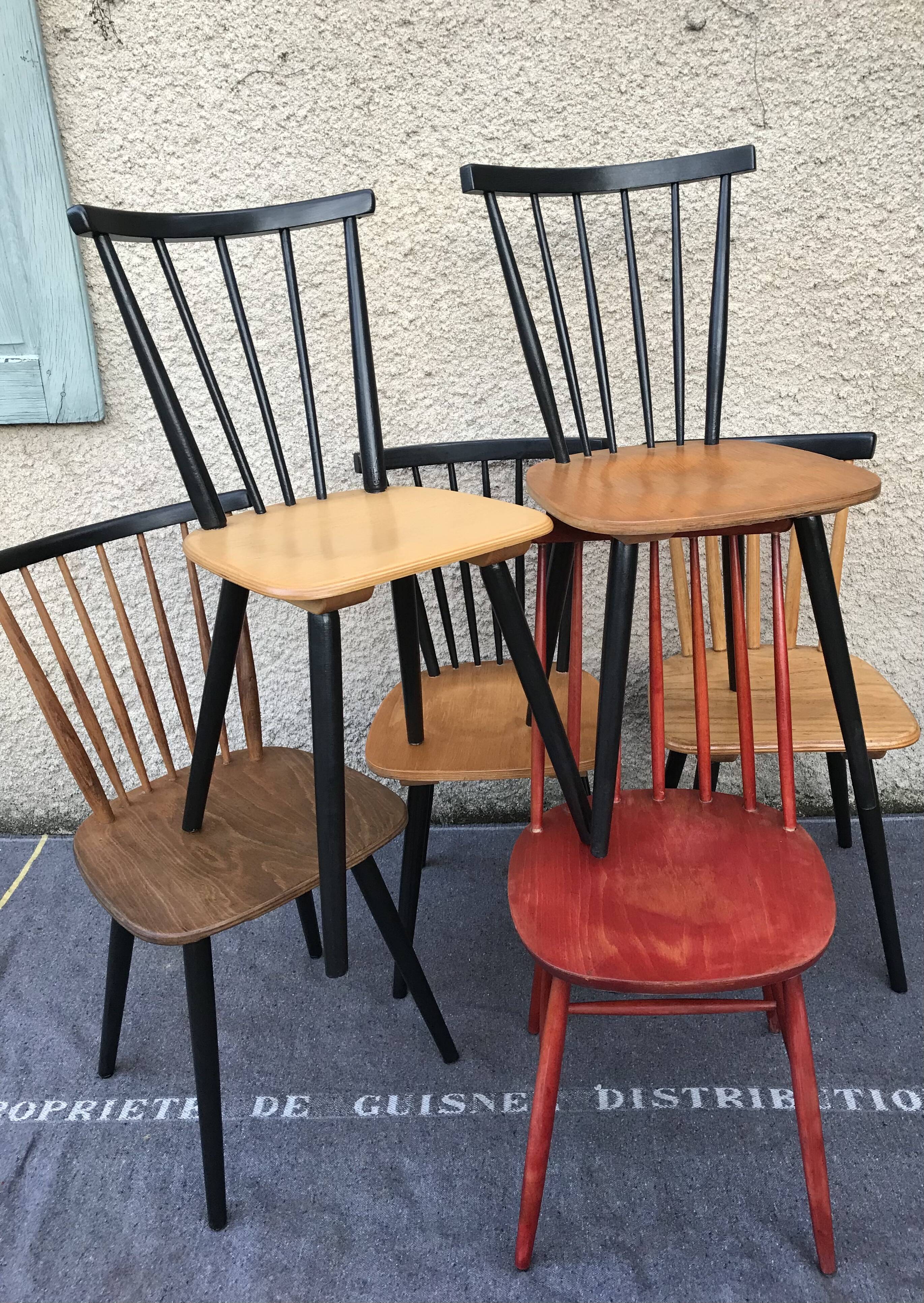 Set of 6 mismatched vintage chairs with bars and compass legs