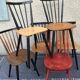 Set of 6 mismatched vintage chairs with bars and compass legs