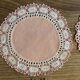 11 pink hand-lace coasters