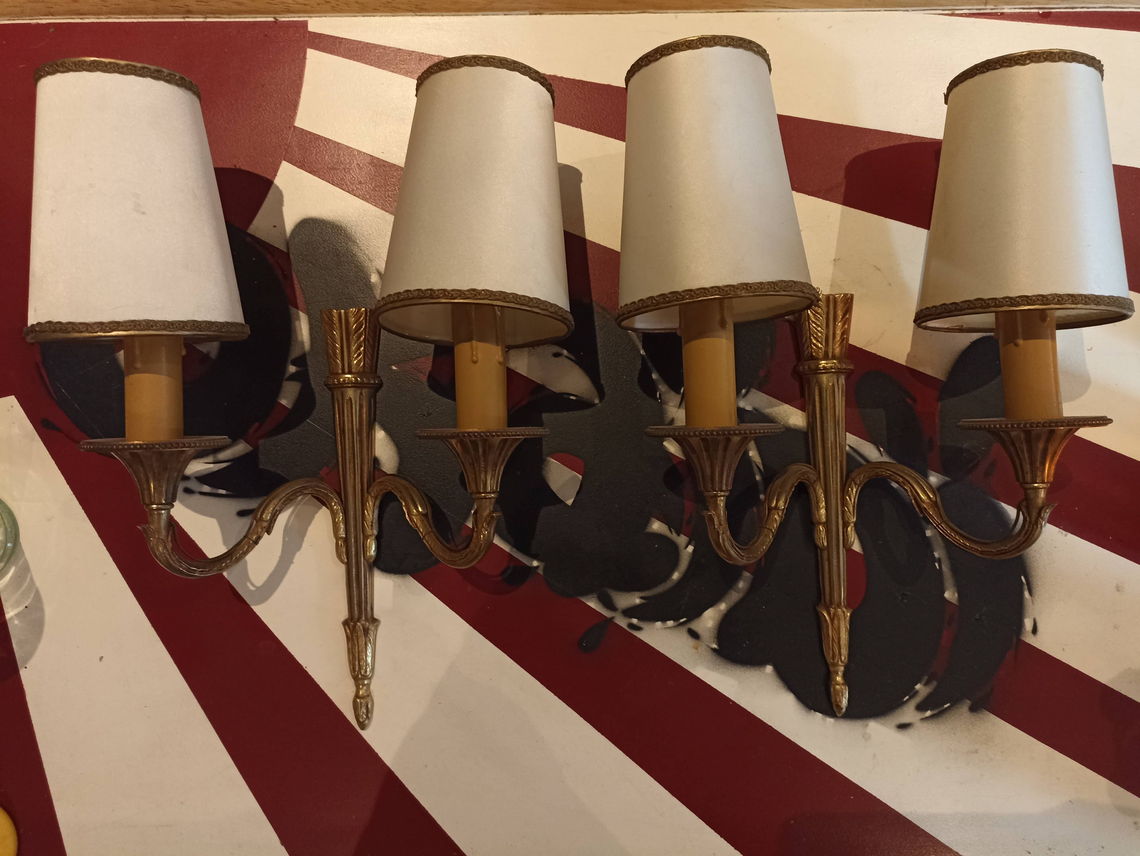 Pair of golden metal candlestick wall lamps