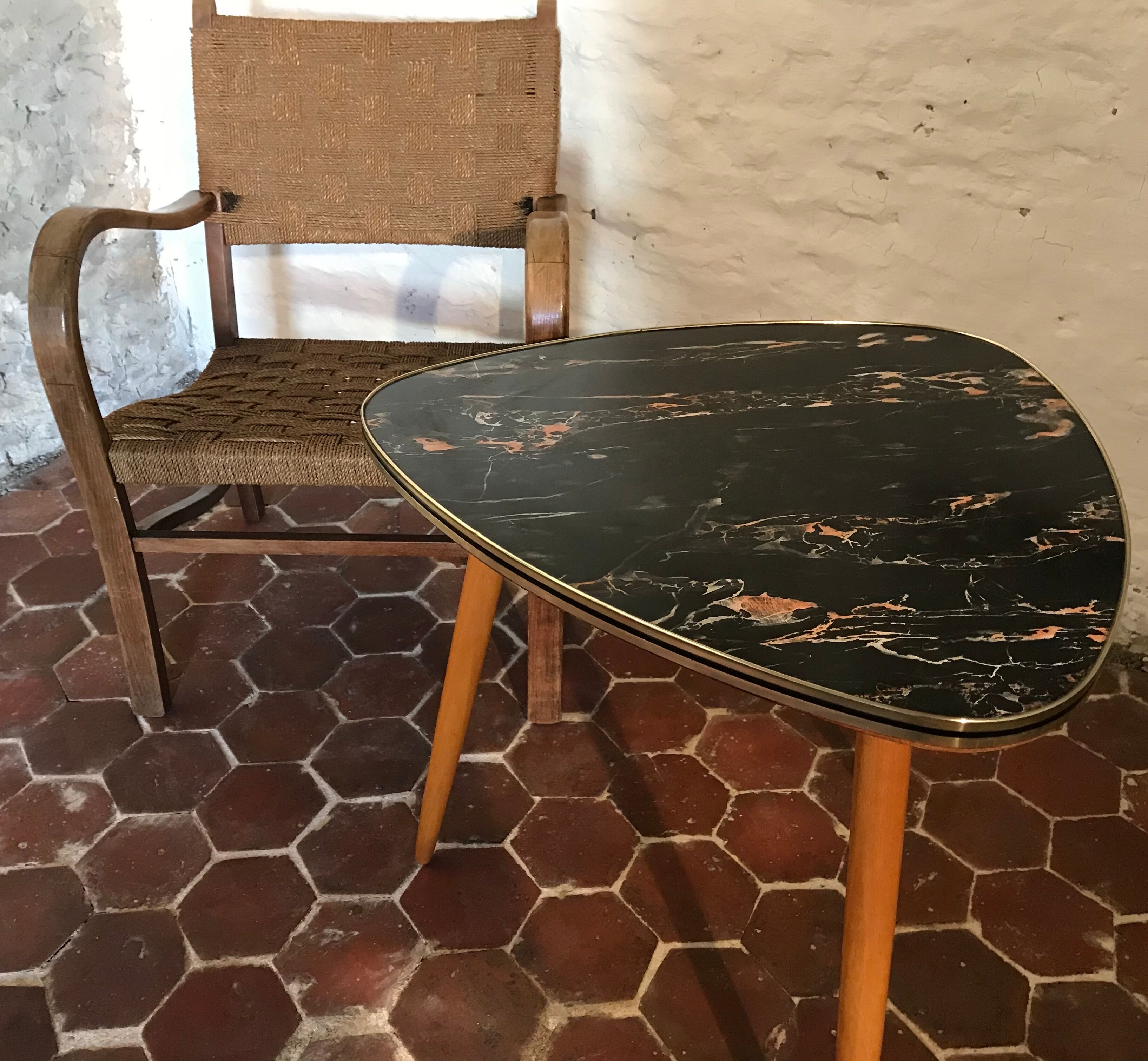 Free-form tripod coffee table
