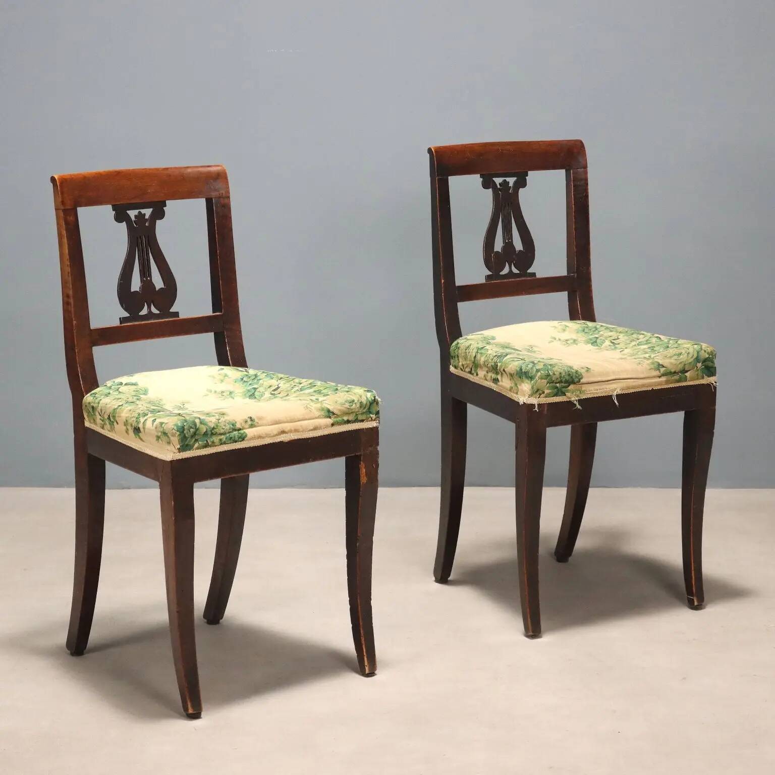 Pair of antique Directoire chairs in walnut and fabric, Italy, 19th century.