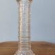 Vendôme column perfume bottle in moulded glass, 19th century.