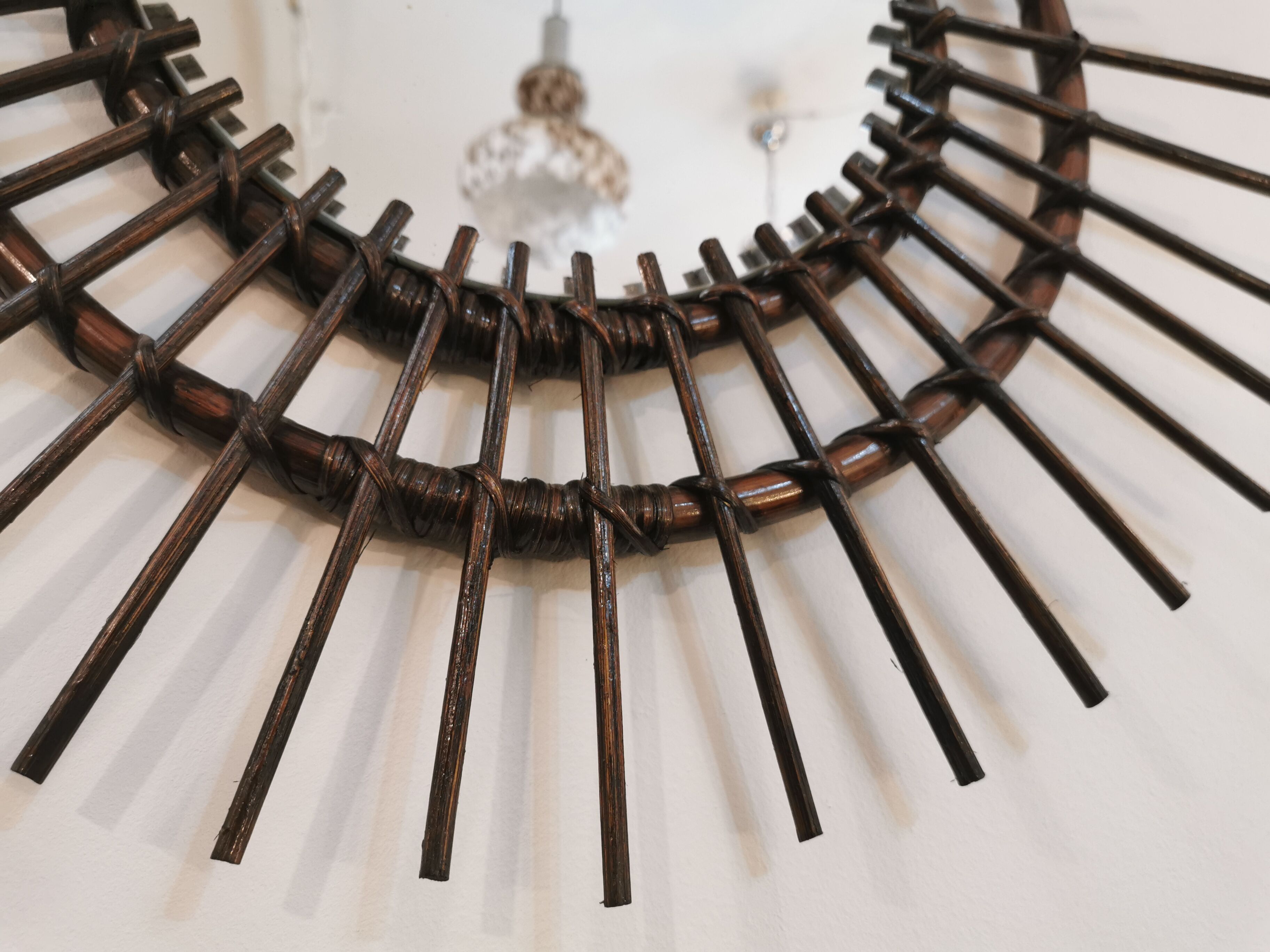 Vintage sun mirror in 60s dark rattan 56cm