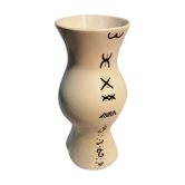 Vase is decorated in white clay;han mad