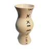 Vase is decorated in white clay;han mad