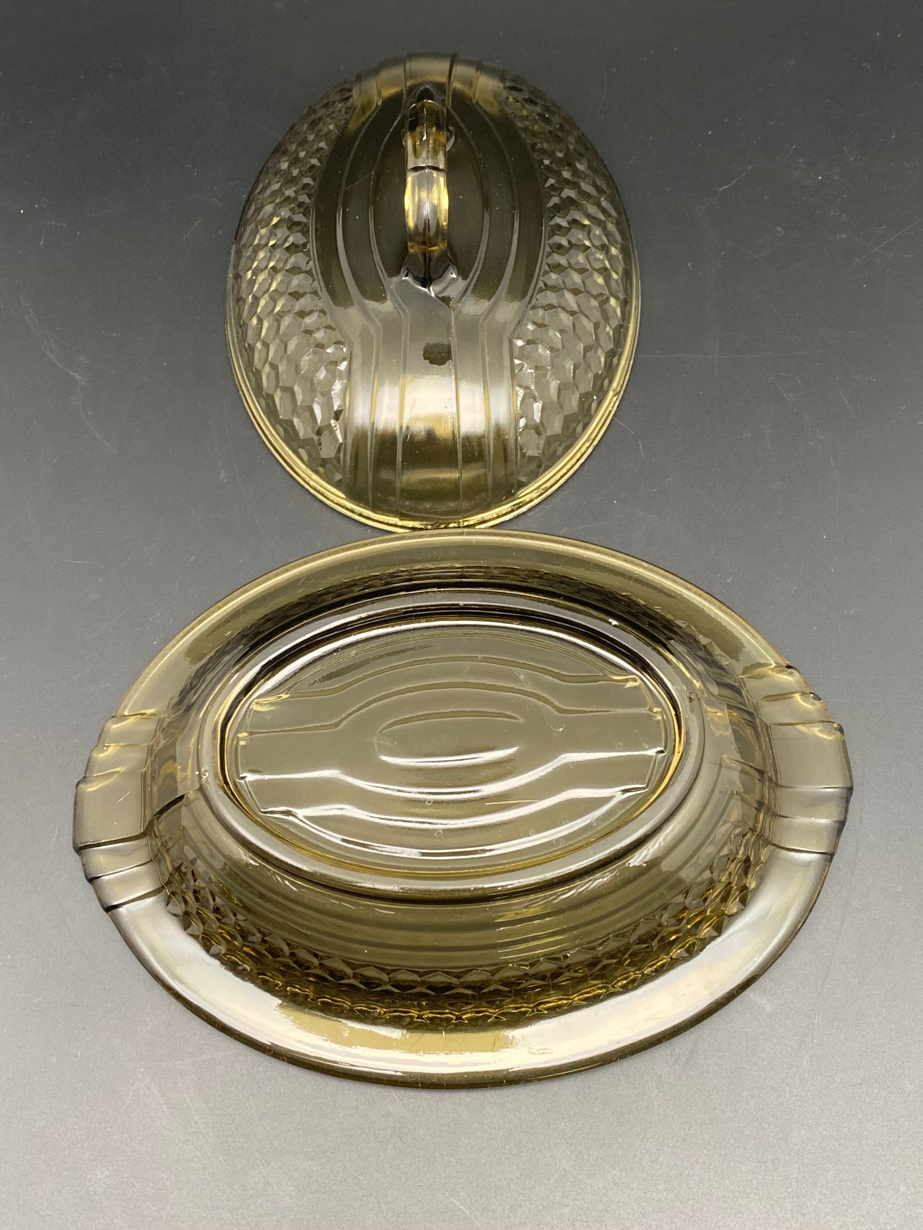 Butter dish or "little casserole" in black colored glass honeycomb pattern