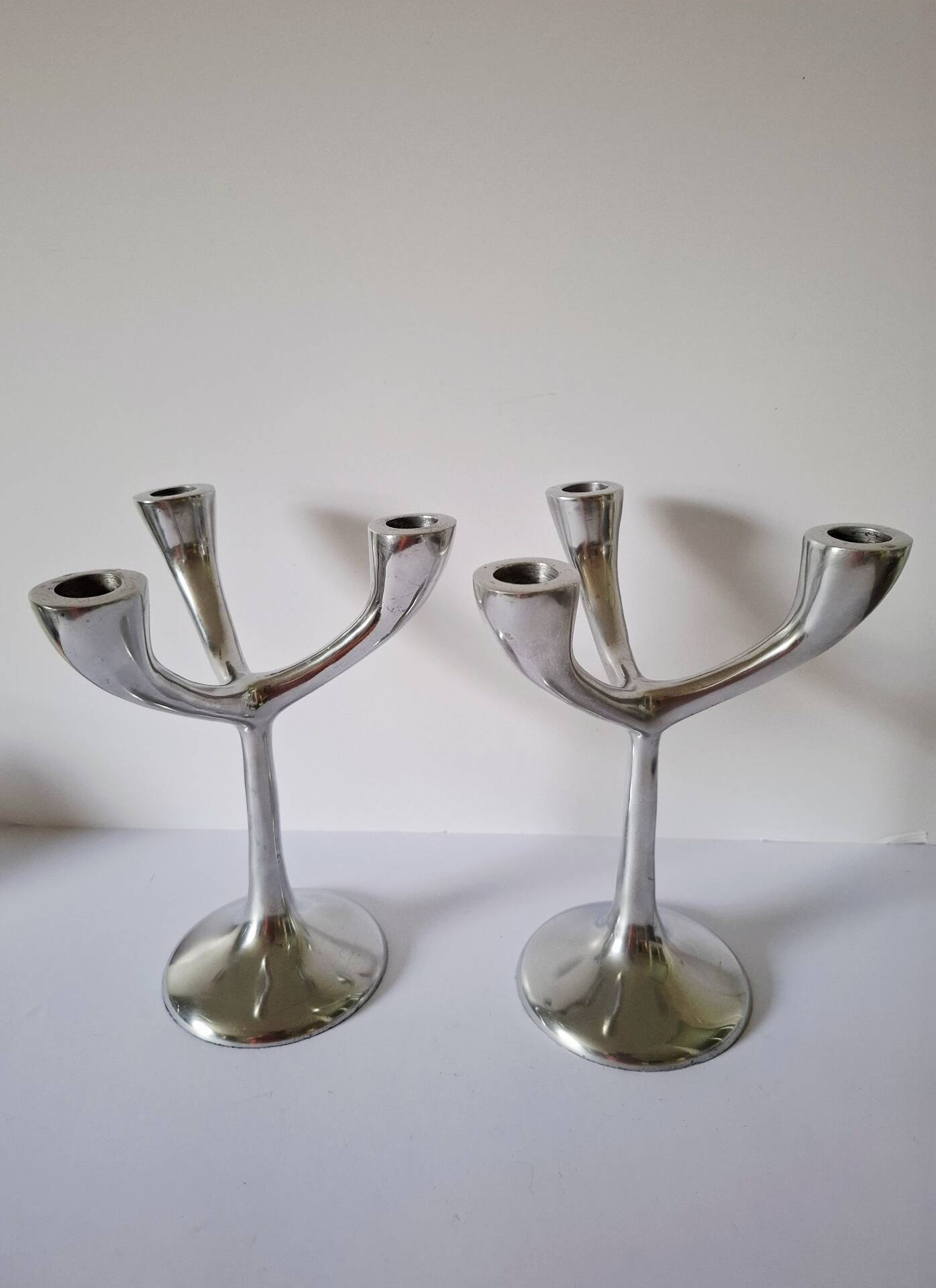 Vintage aluminium candlestick duo
