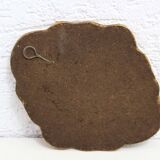 Golden mirror with decor