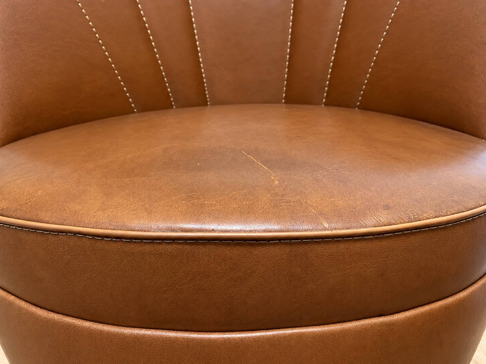 Vintage cognac fringe tub chairs